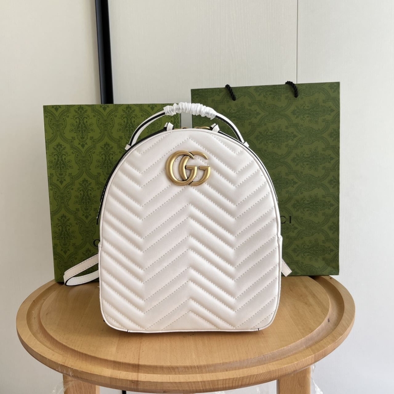 G*u*i backpacks
